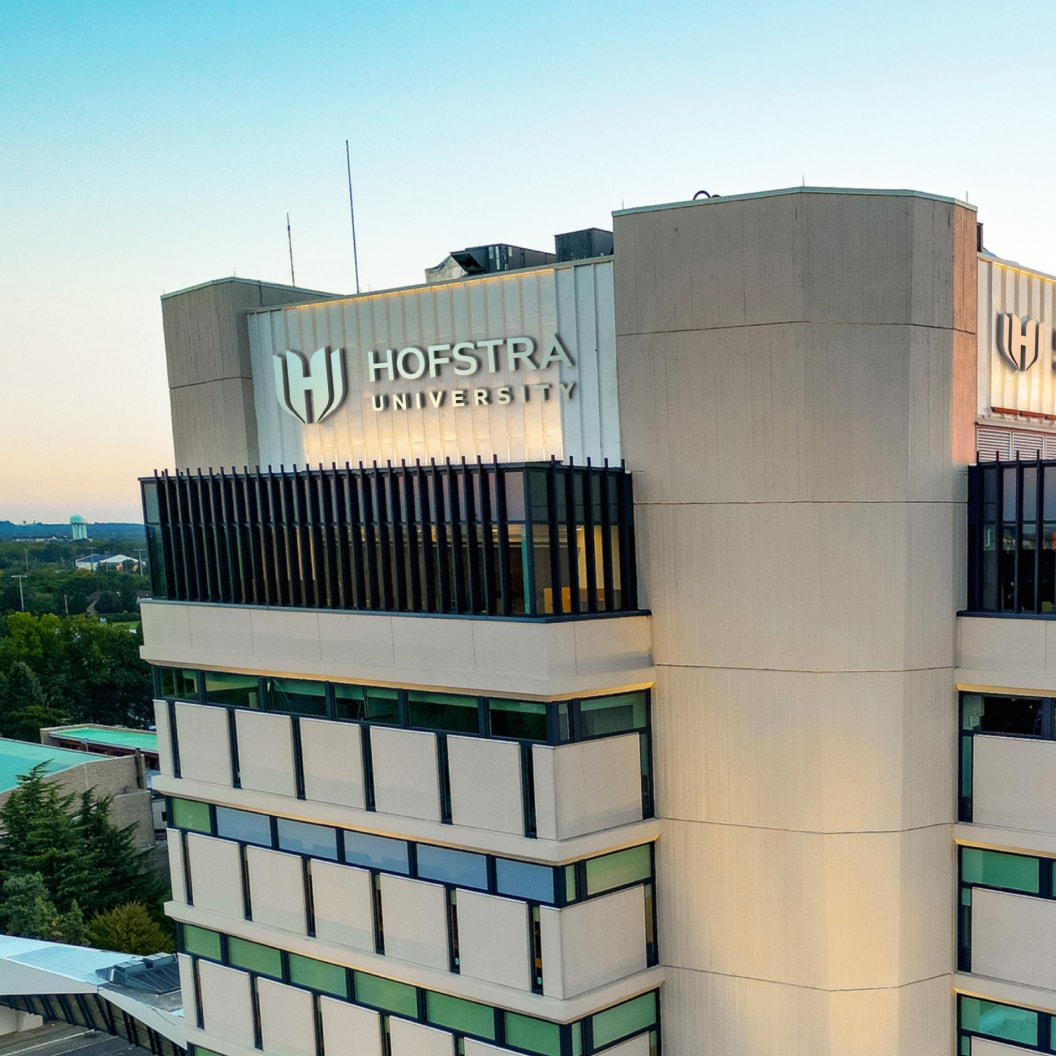 Campus building with new Hofstra brand signage